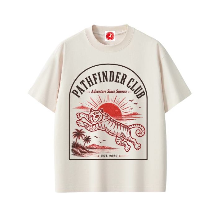 Beige t-shirt with 'Pathfinder Club' graphic design featuring a tiger and sunset on a white background.