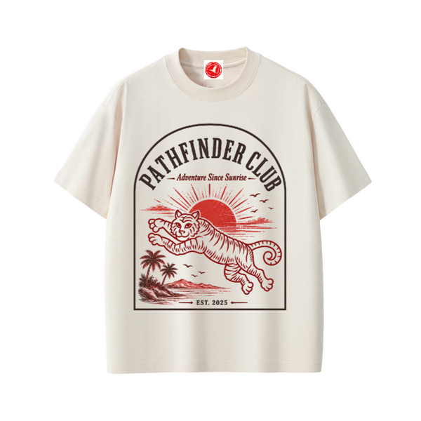 Beige t-shirt with 'Pathfinder Club' graphic design featuring a tiger and sunset on a white background.