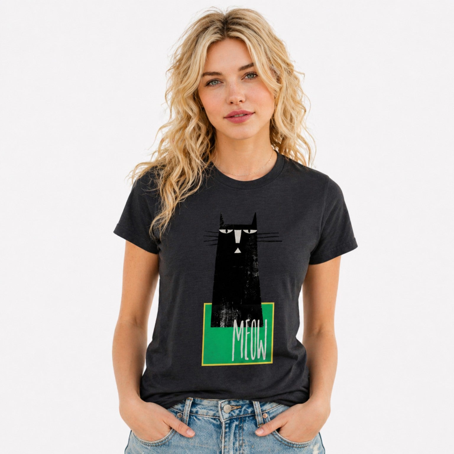Woman wearing a black MEOW graphic t-shirt featuring minimalist cat artwork inspired by feline lovers and modern design.