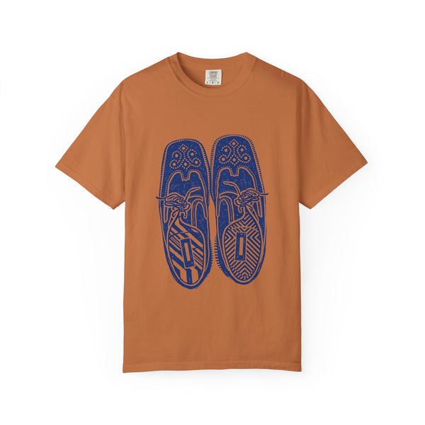 Brown t-shirt with blue shoe design on a white background