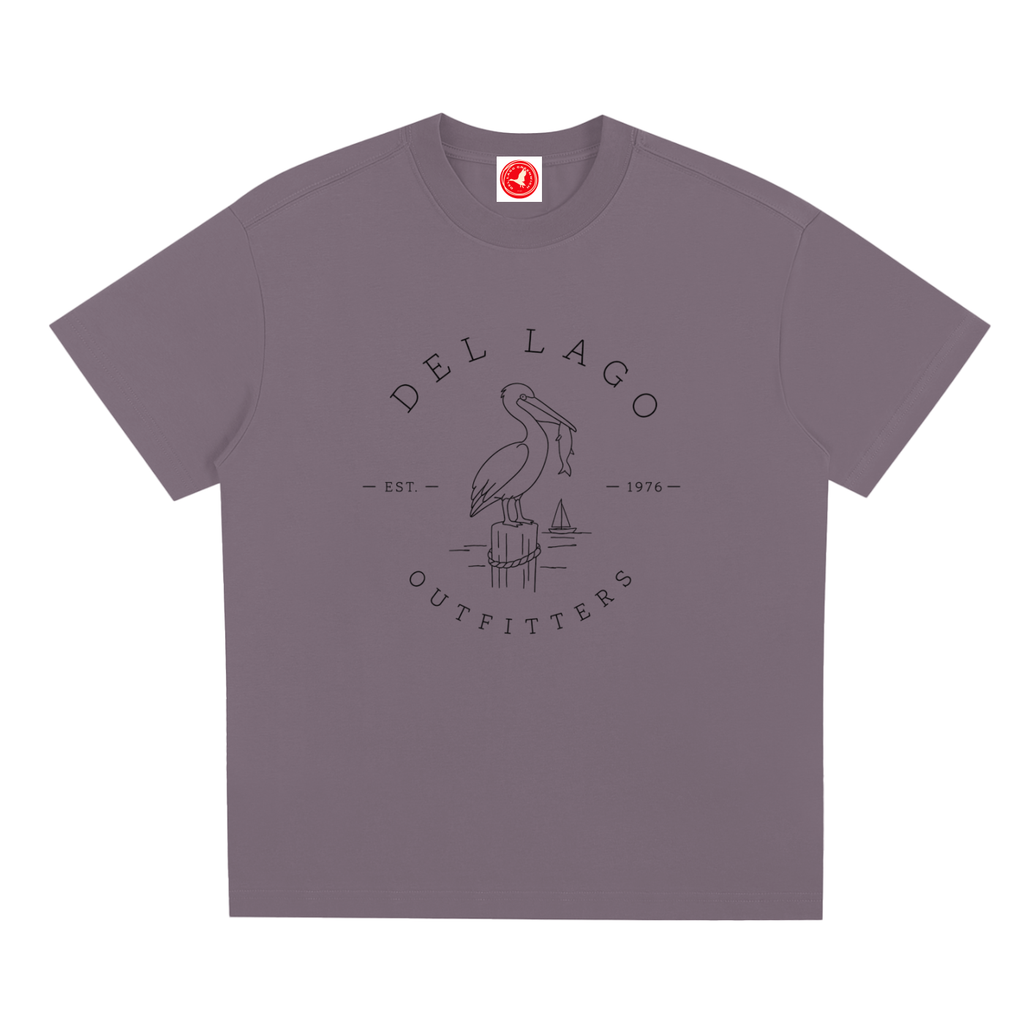 Brown Pelican graphic t-shirt featuring original coastal bird artwork inspired by beach living and nature.