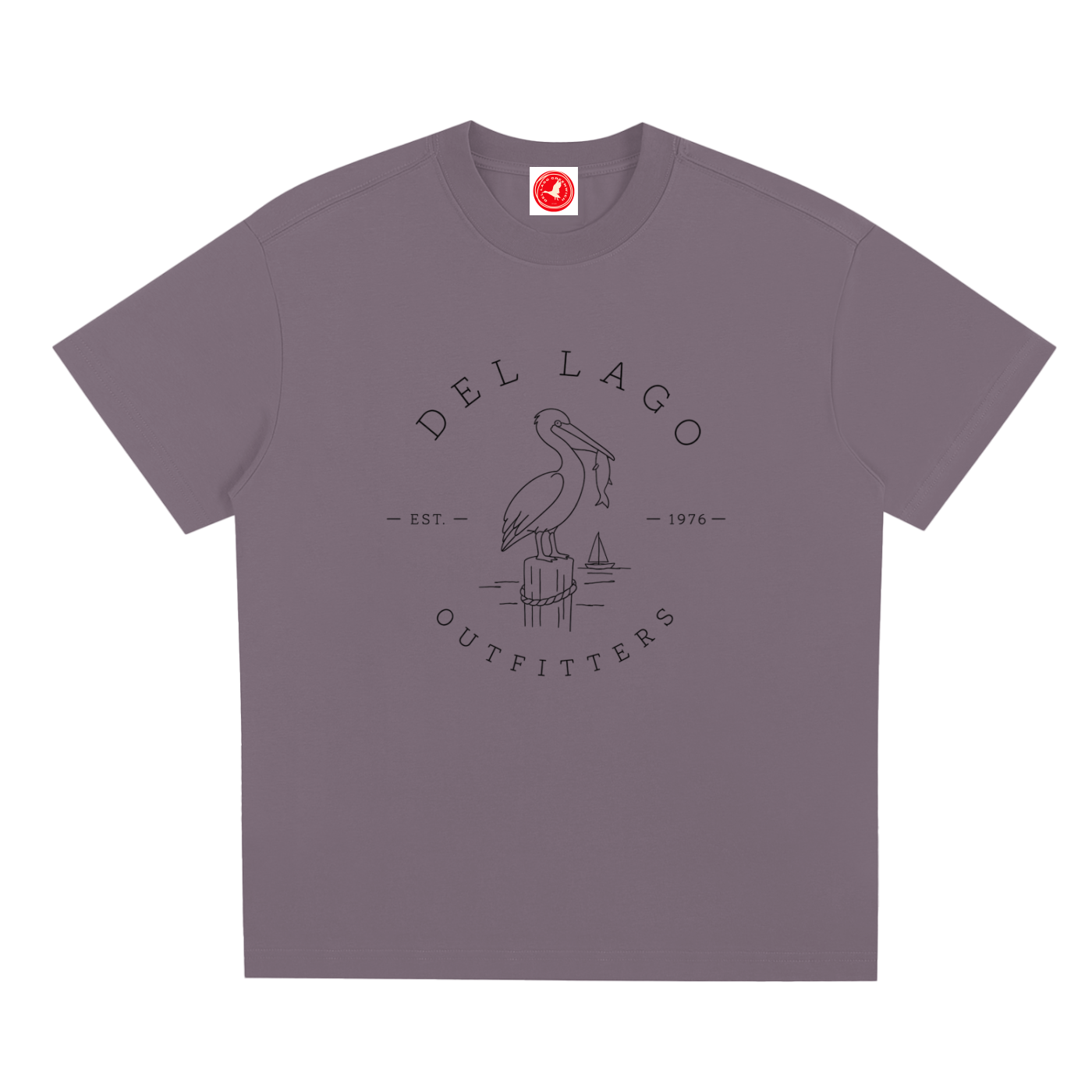 Brown Pelican graphic t-shirt featuring original coastal bird artwork inspired by beach living and nature.