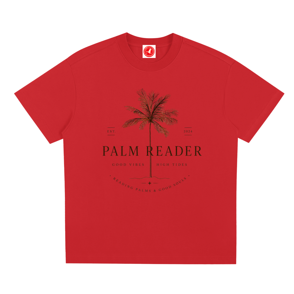 Red Coastal graphic t-shirt featuring palm-themed artwork inspired by beach life, sunshine, and tropical escapes.