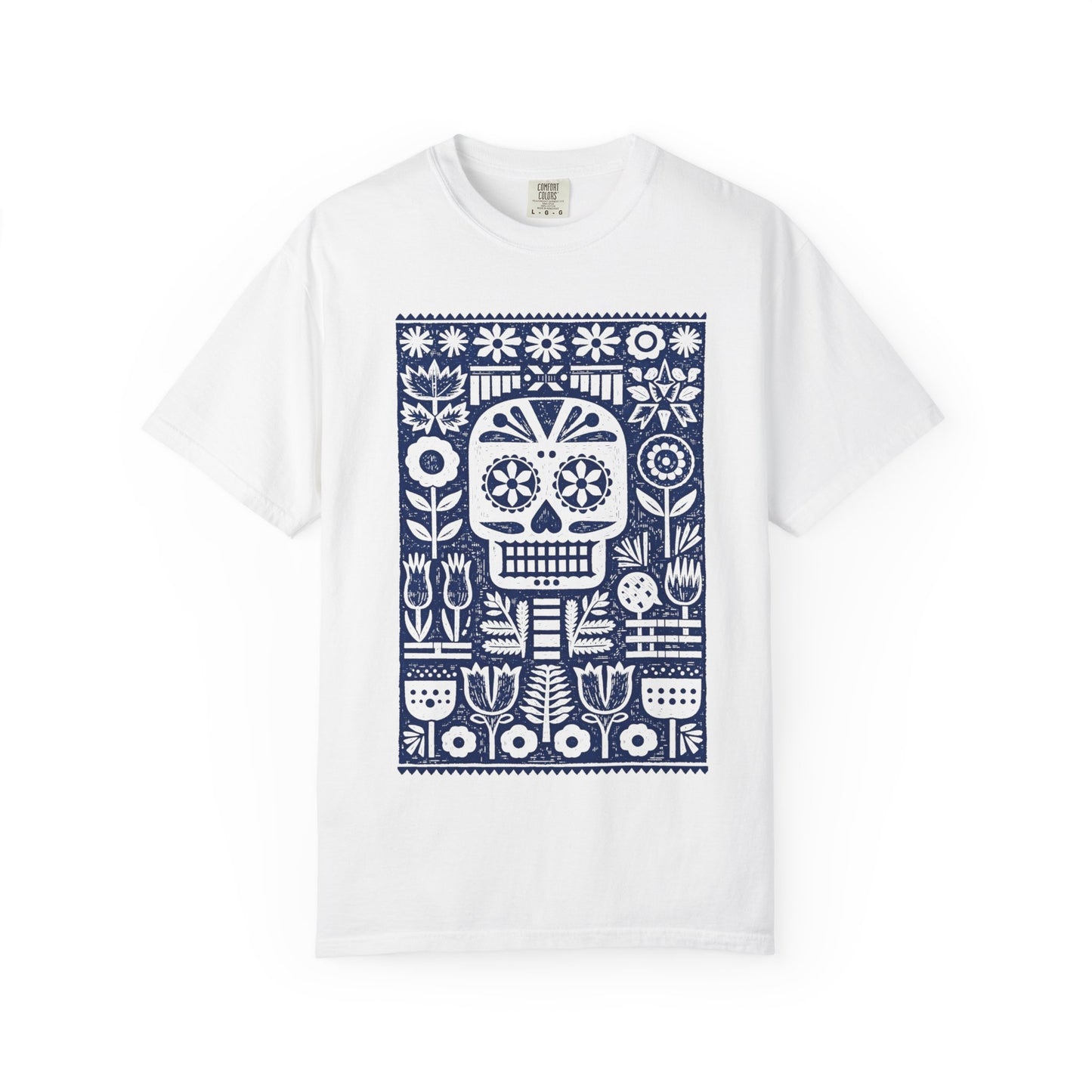 White t-shirt with a blue skull and floral pattern on a white background