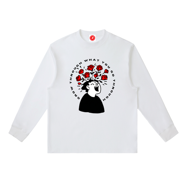 White long-sleeve shirt with a graphic design on a white background