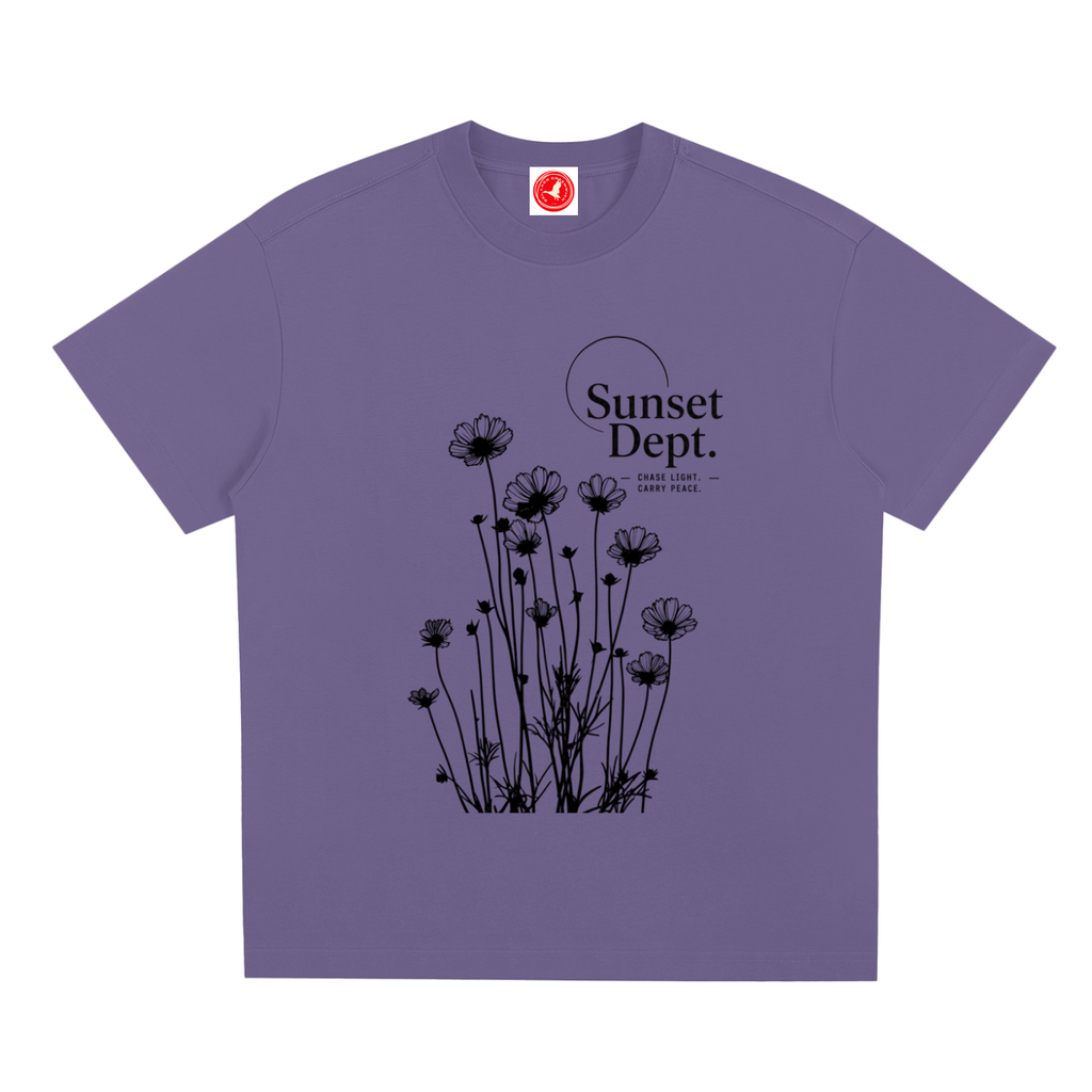 Purple Desert-inspired graphic t-shirt featuring artistic landscape artwork blending desert scenery with coastal influences.
