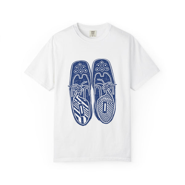 White t-shirt with blue shoe design on a white background