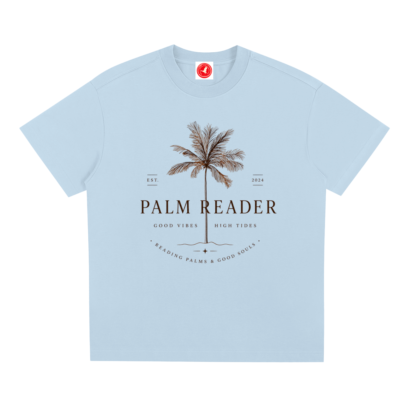 Light blue Coastal graphic t-shirt featuring palm-themed artwork inspired by beach life, sunshine, and tropical escapes.