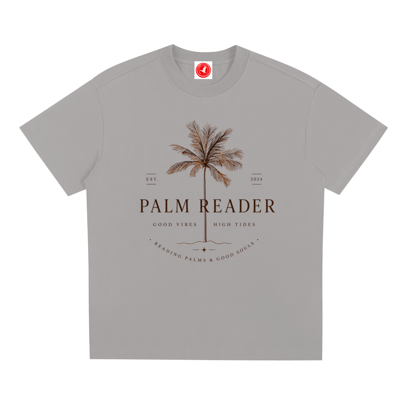 Gray Coastal graphic t-shirt featuring palm-themed artwork inspired by beach life, sunshine, and tropical escapes.