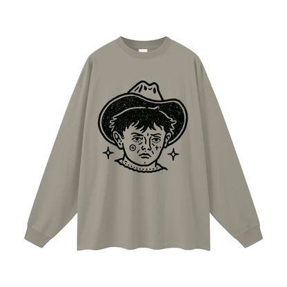 Beige long-sleeve shirt with black graphic of a tattooed cowboy