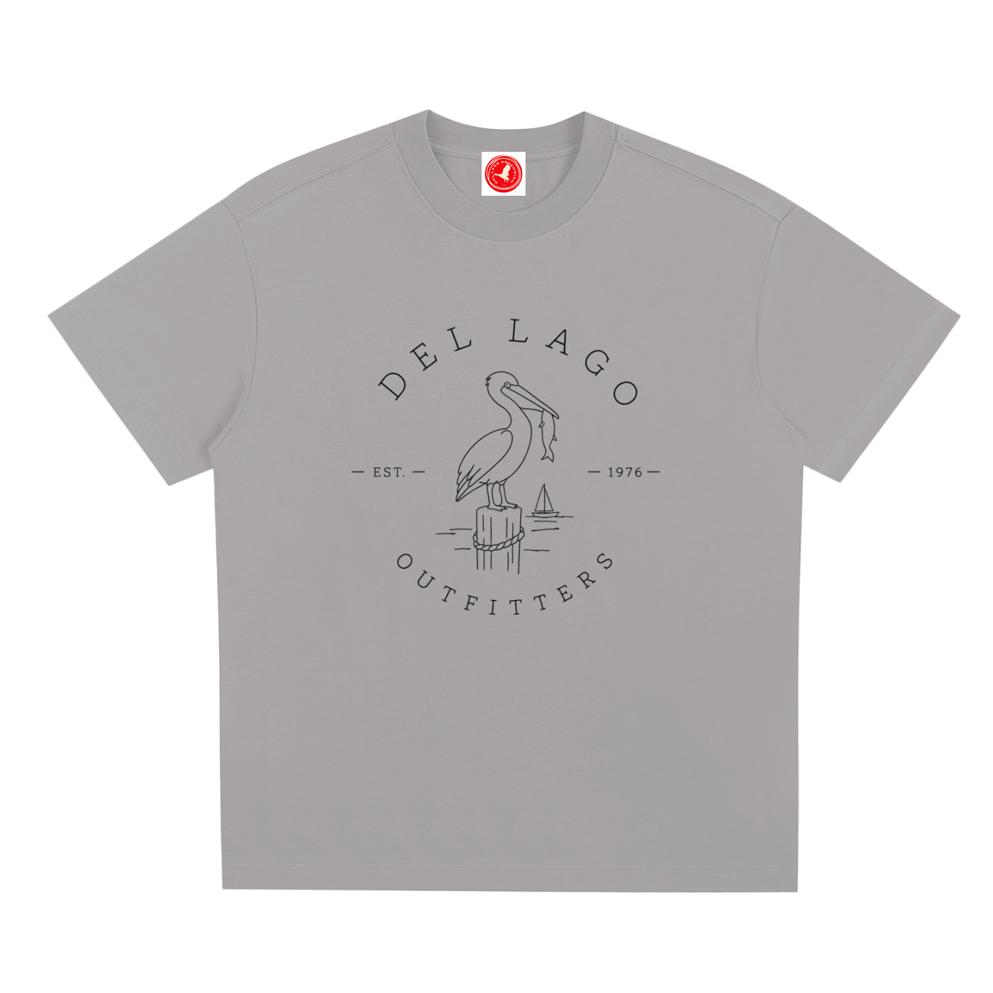 Pelican graphic t-shirt featuring original coastal bird artwork inspired by beach living and nature.