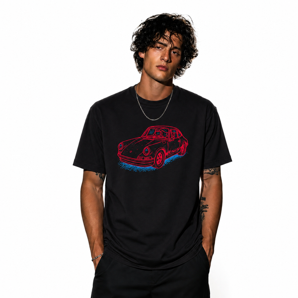 Man wearing the Silent Tactical black oversized graphic t-shirt featuring a neon-inspired sports car design and relaxed streetwear fit.