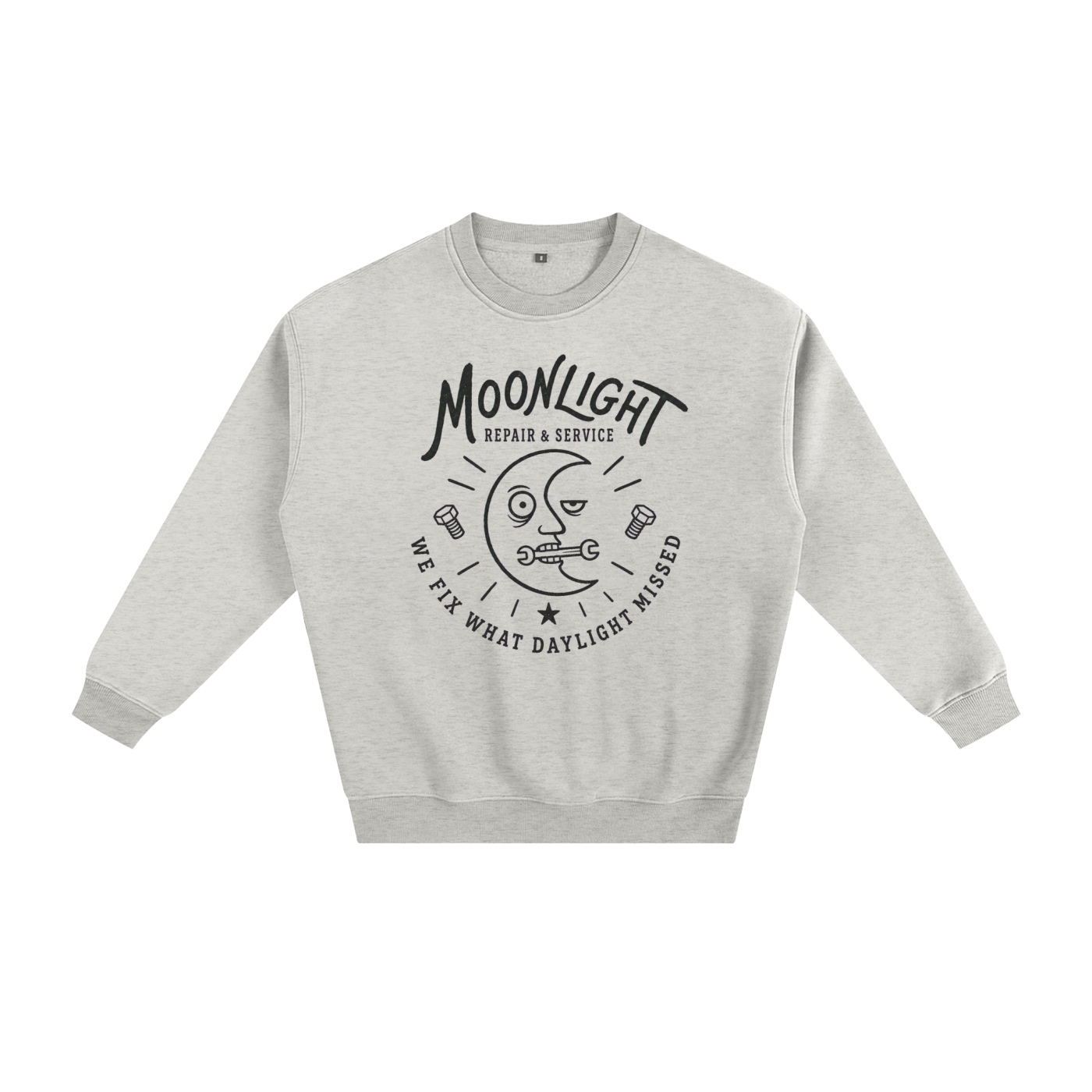 A light heather gray crewneck sweatshirt with a black graphic print on the front featuring a moon face, the text 'MOONLIGHT', and 'WE FIX WHAT DAYLIGHT MISSED'.