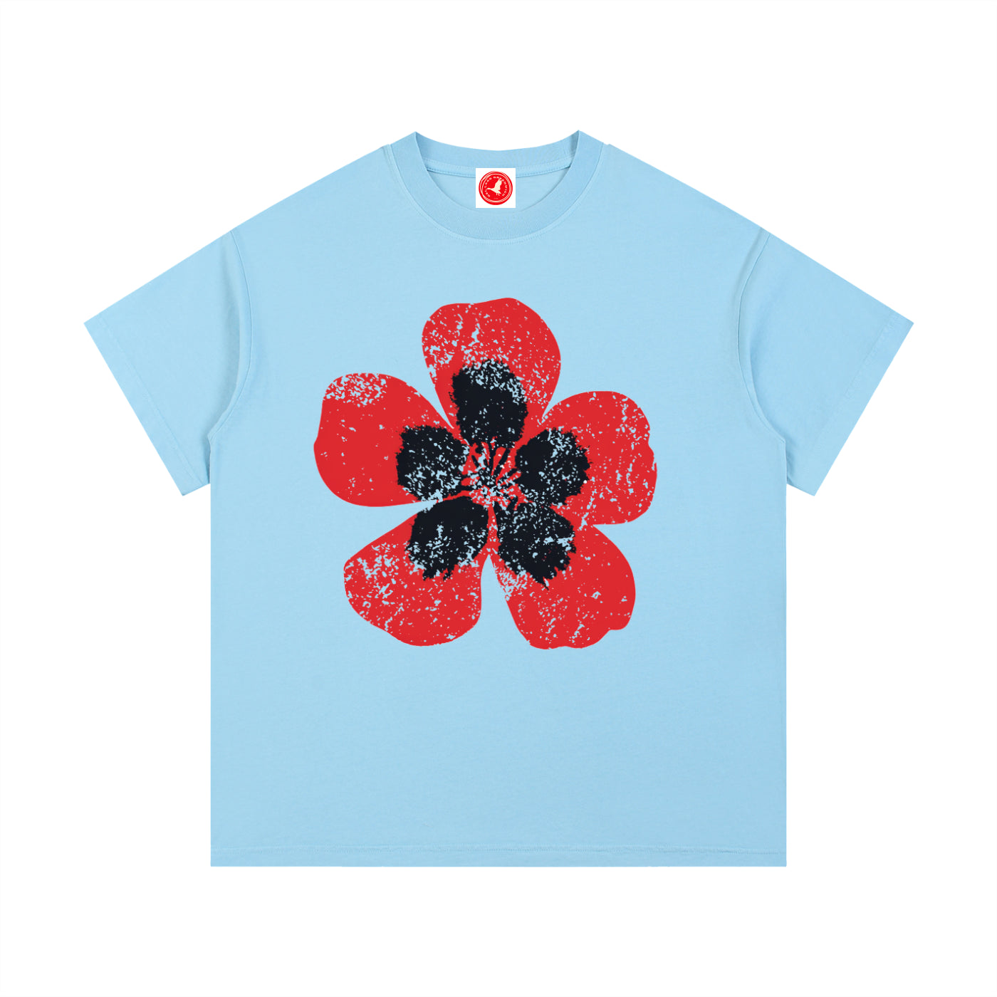 Light blue Poppy Bloom graphic t-shirt featuring floral artwork inspired by wildflowers, nature, and botanical beauty.