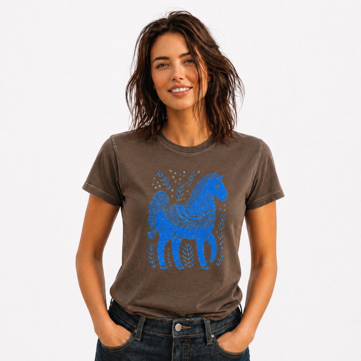 Woman wearing a brown t-shirt with a blue horse graphic on a white background