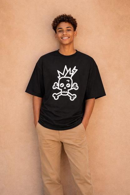 Person wearing a black t-shirt with a white graphic design on a beige background