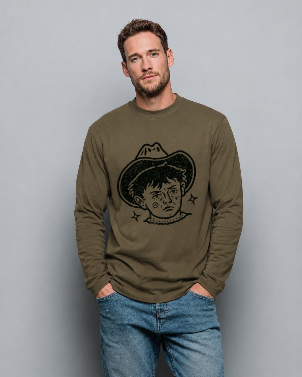 Man wearing a green long-sleeve shirt with a graphic design on a gray background
