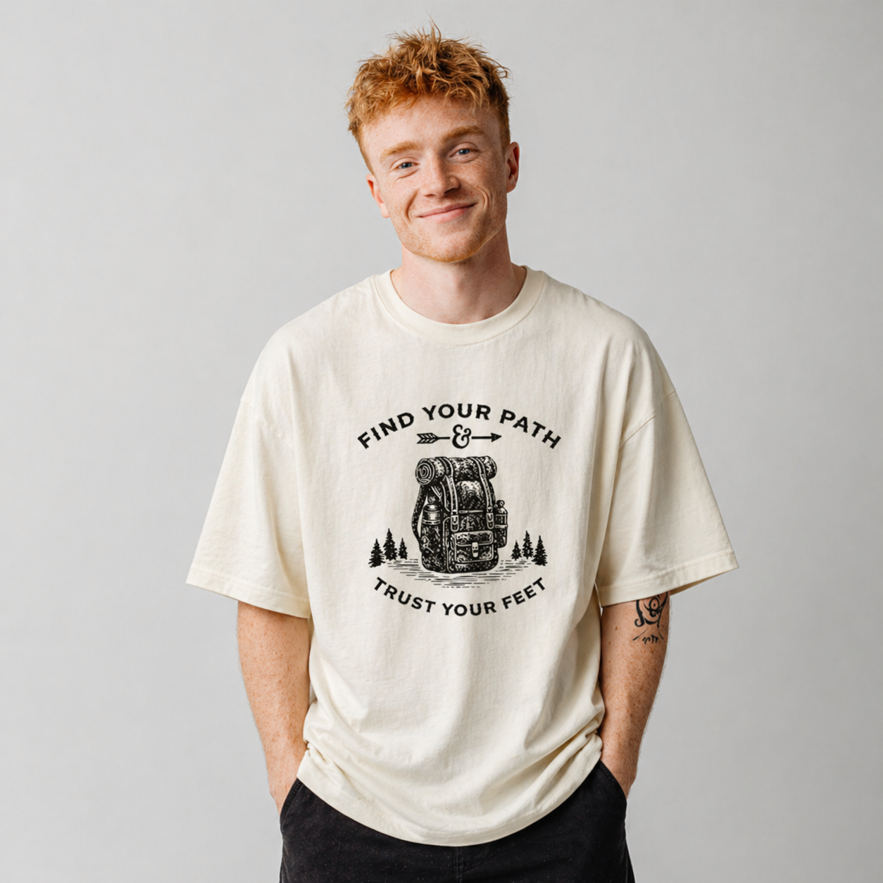 Youth model wearing Find Your Path Tee with exploration-inspired compass graphic