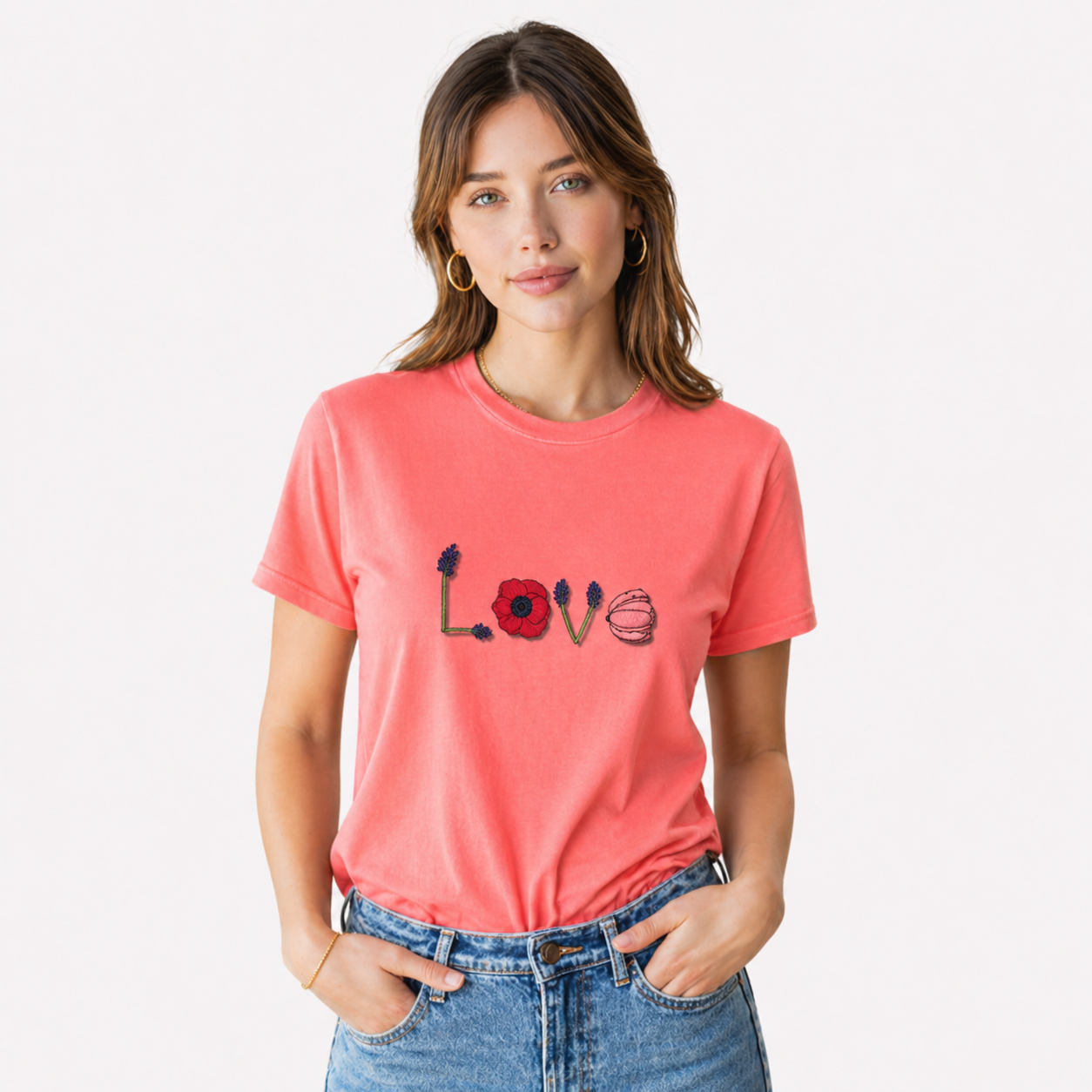 Woman wearing a coral t-shirt with 'LOVE' and heart designs on a white background