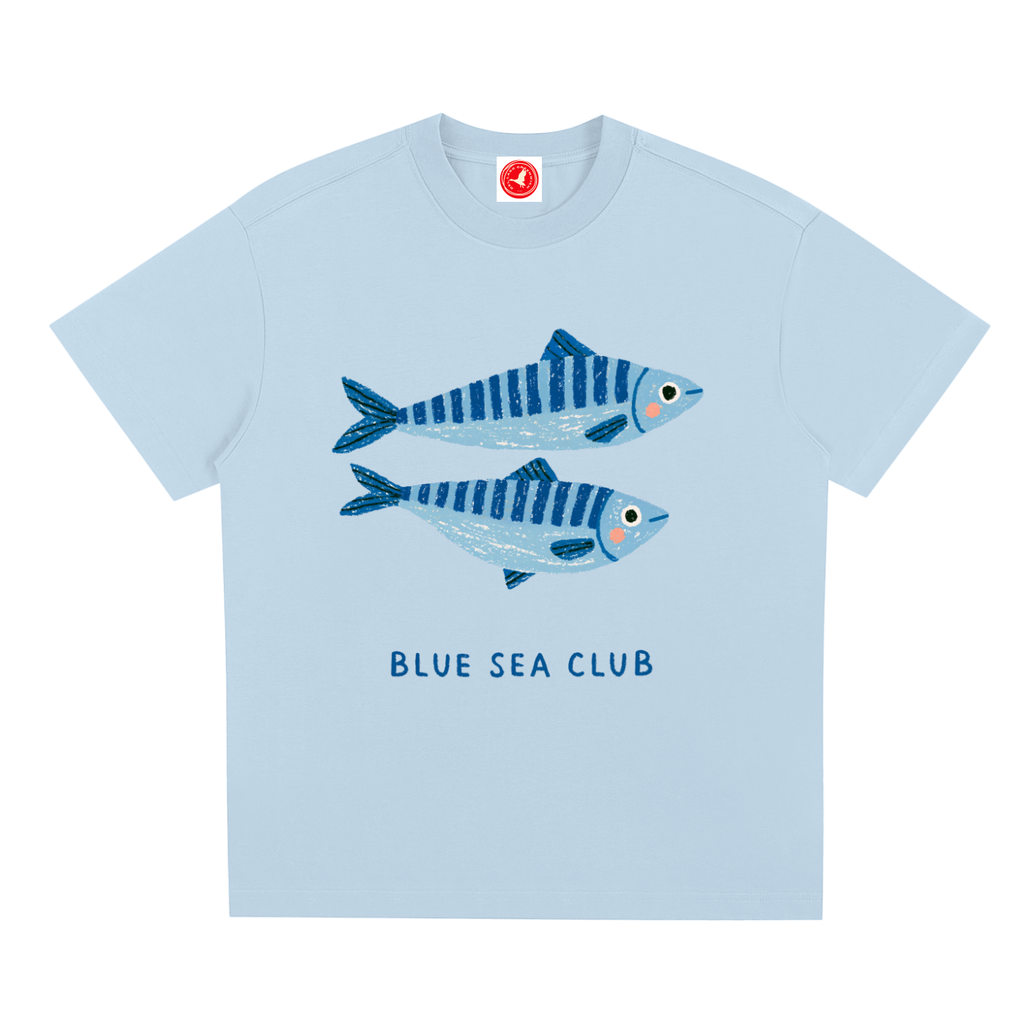Light blue t-shirt with fish design and 'Blue Sea Club' text on a white background