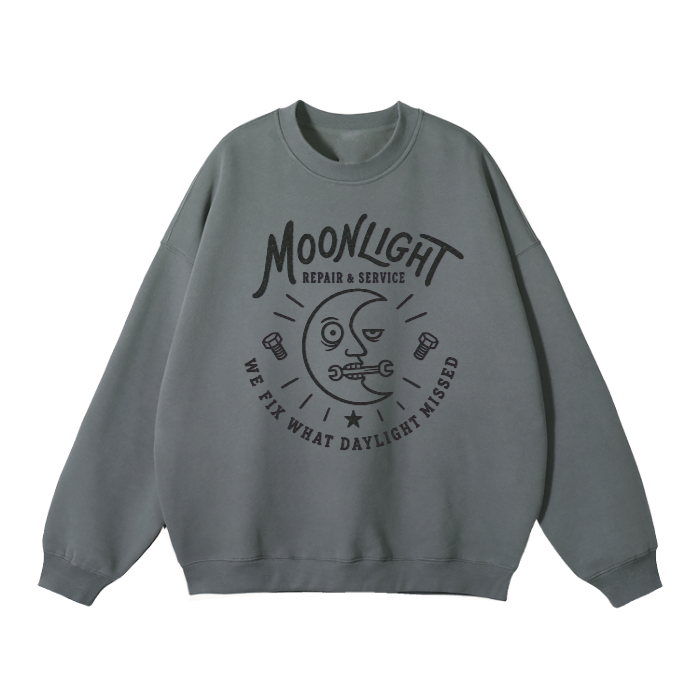 A gray crewneck sweatshirt featuring a black graphic print on the front with a moon illustration and the text 'MOONLIGHT REPAIR & SERVICE WE FIX WHAT DAYLIGHT MISSED'.