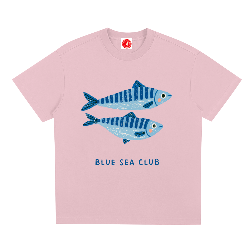PinkBlue Sea Club graphic t-shirt featuring coastal-inspired artwork celebrating ocean adventures and seaside living.