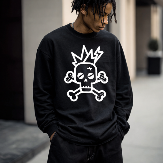 Person wearing a black sweatshirt with a white skull and crossbones design.