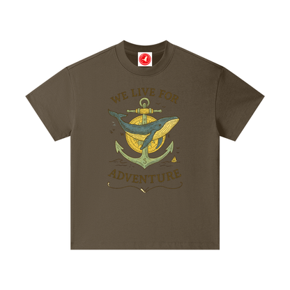 Brown t-shirt with a graphic design of a whale, anchor, and text on a white background