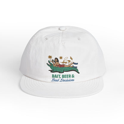 White surfer cap featuring a retro beach graphic with tropical artwork and vintage-inspired design.