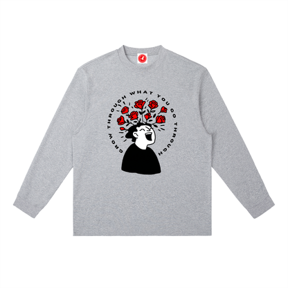 Gray long-sleeve shirt with a graphic design on a white background