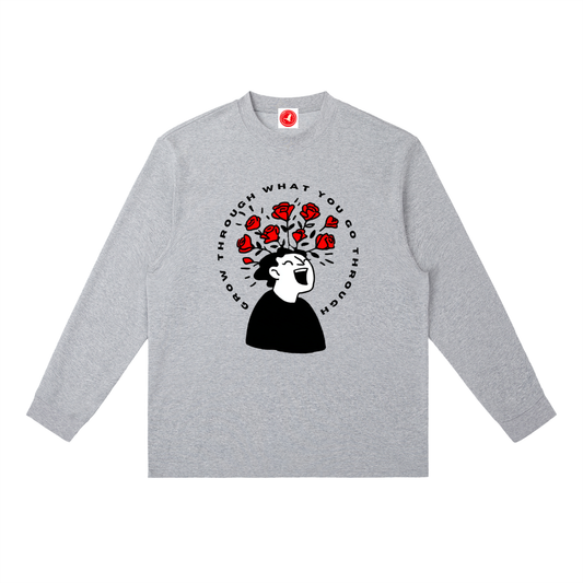 Gray long-sleeve shirt with a graphic design on a white background