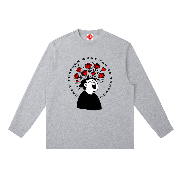 Gray long-sleeve shirt with a graphic design on a white background