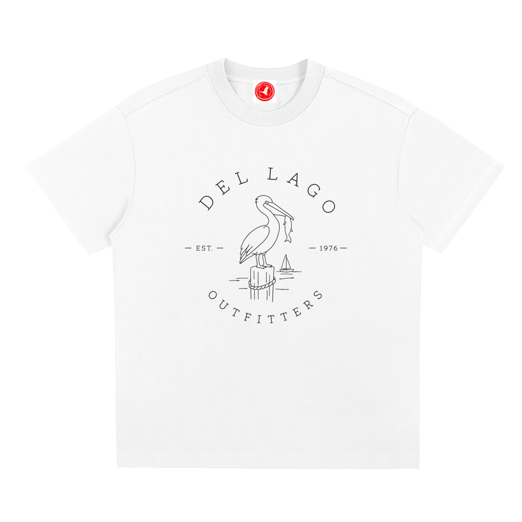 White Pelican graphic t-shirt featuring original coastal bird artwork inspired by beach living and nature.