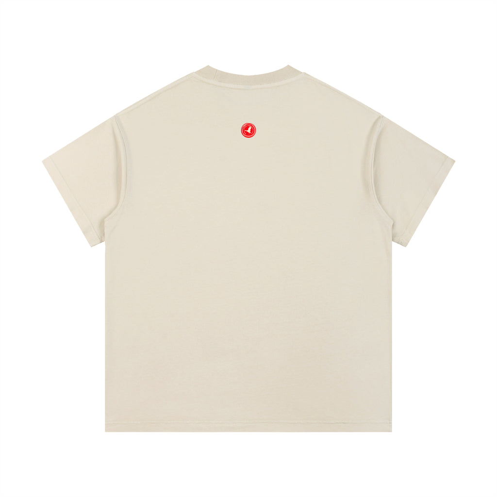 Beige Abstract Folk Creature graphic t-shirt featuring artistic folk-inspired creature artwork and imaginative storytelling design.