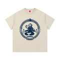 Beige Sacred Monkey graphic t-shirt featuring artistic monkey artwork inspired by folklore, spirituality, and creative expression.