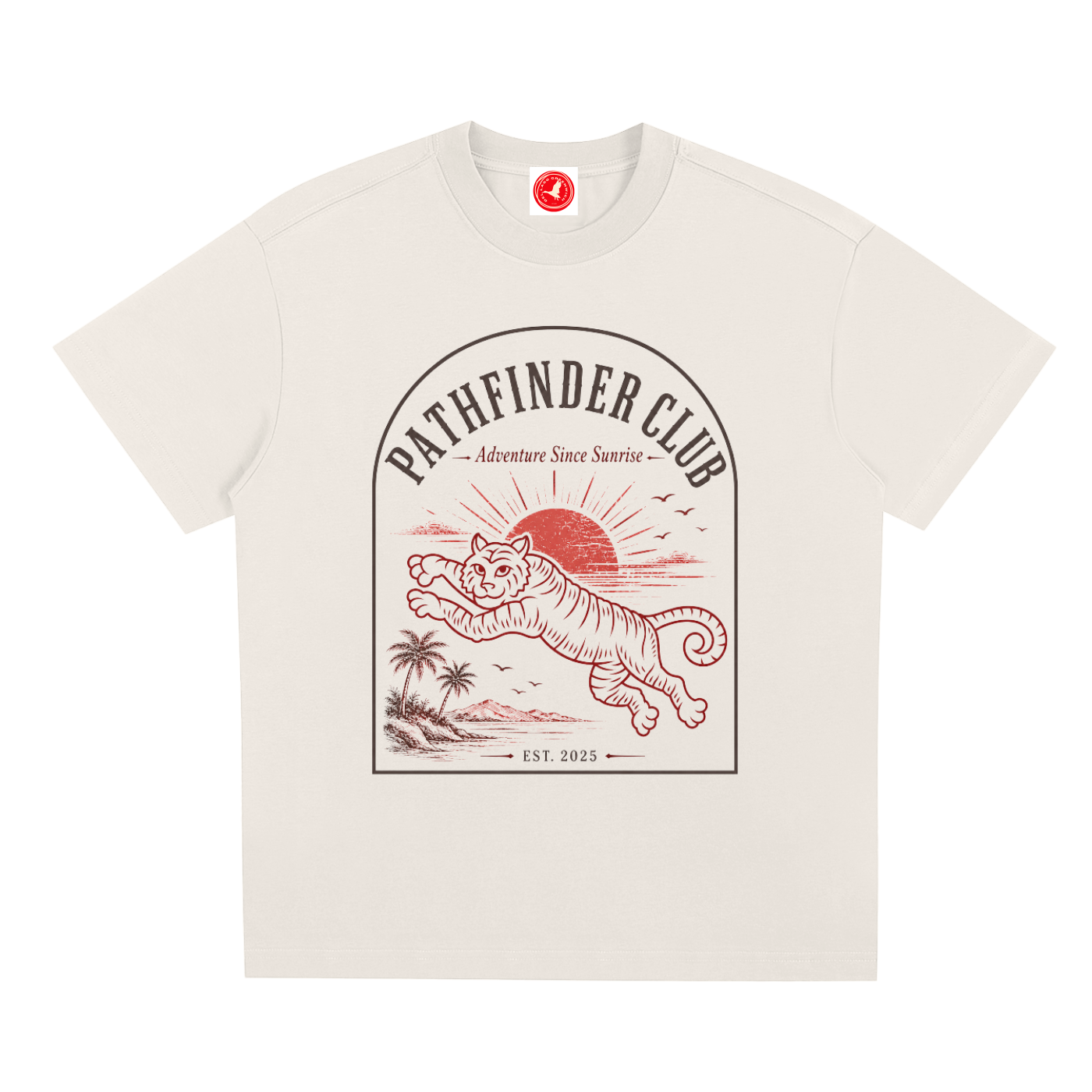 Beige t-shirt with a graphic of a tiger and sunset design on a white background