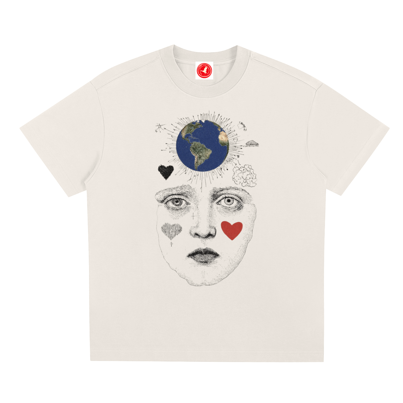 Beige t-shirt with a graphic design of a face, hearts, and Earth on a white background
