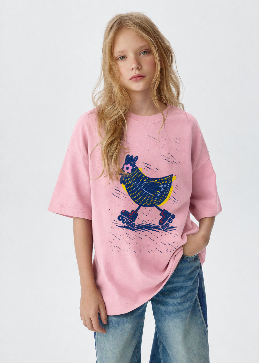 Model wearing the Roller Skating Chicken graphic t-shirt featuring playful chicken artwork inspired by fun, creativity, and retro charm.