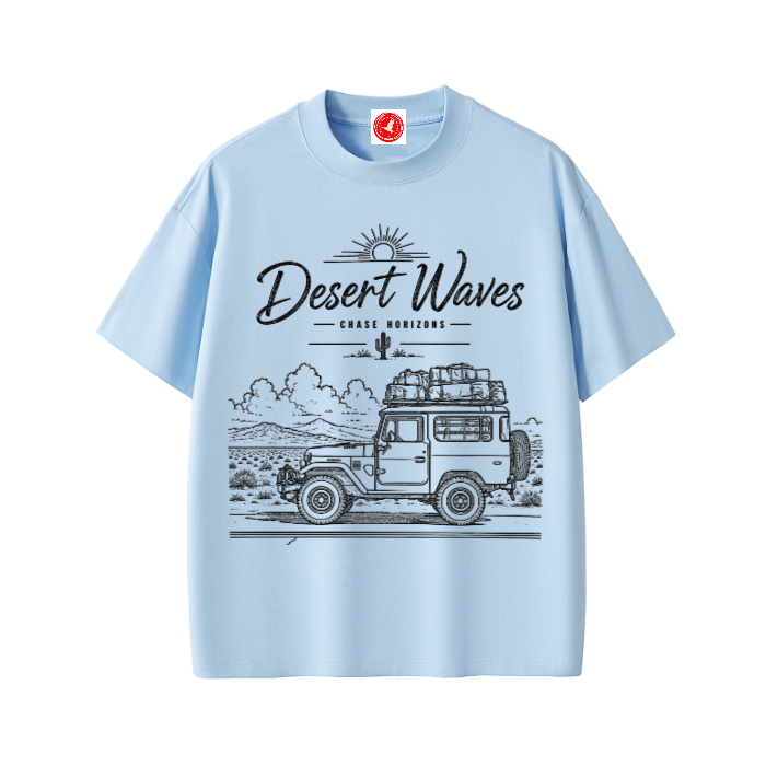 Light blue Desert-inspired graphic t-shirt featuring artistic landscape artwork blending desert scenery with coastal influences.