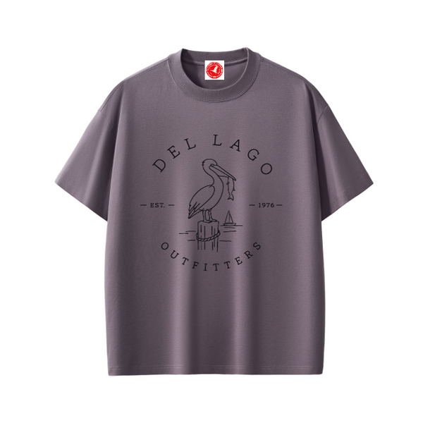 Pelican graphic t-shirt featuring original coastal bird artwork inspired by beach living and nature.
